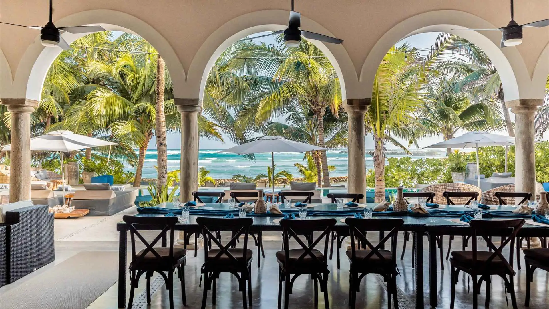 Long dining table under the arches